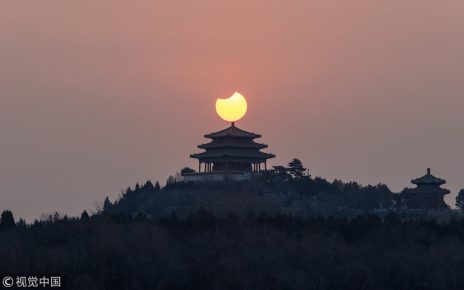 The first partial solar eclipse in 2019, captured by photographers in Beijing