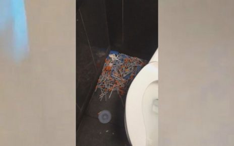 Viral video shows woman discovering pile of needles in McDonald’s bathroom