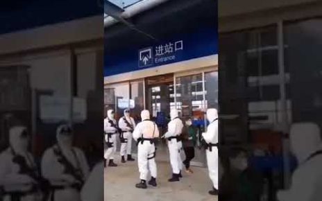 WATCH: Armored Guard in Chemical Protection Suit at Wuhan Terminal